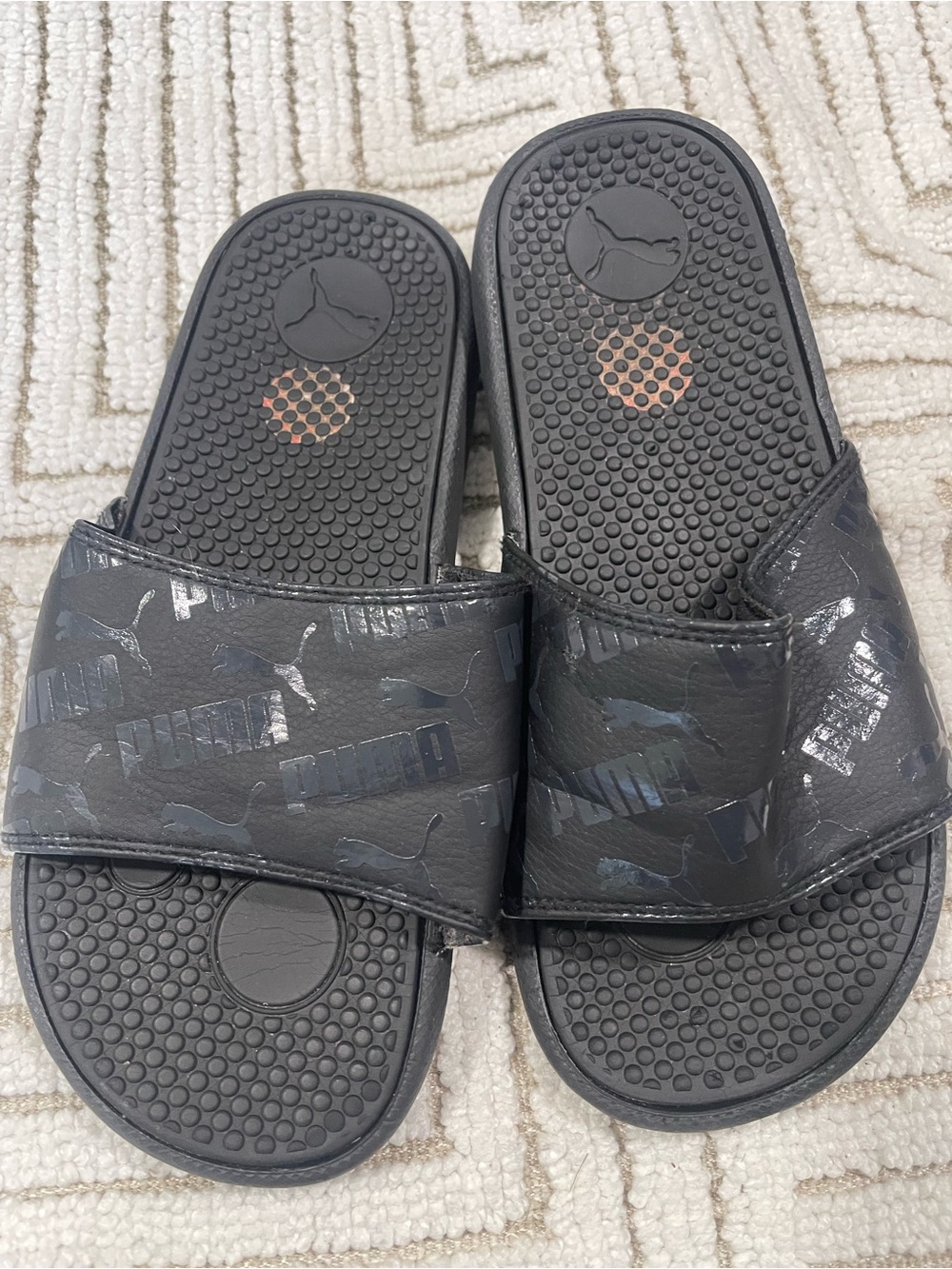 Puma Black Slide Sandals with White Size Label